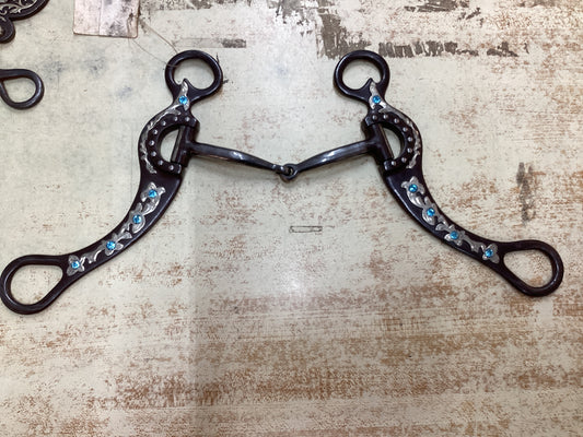 Locked broken snaffle bit with floral and colored gems on shanks