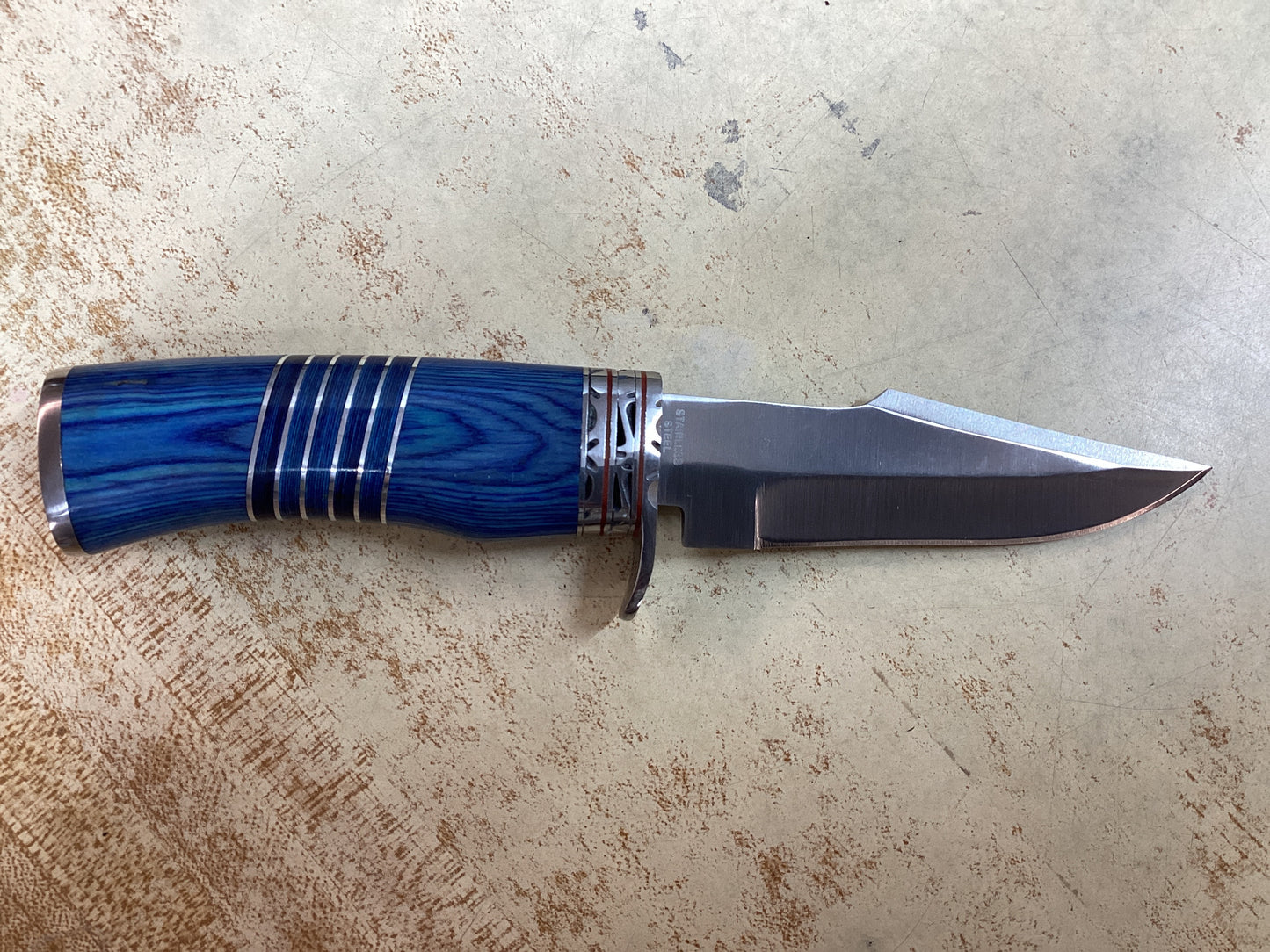 8 1/8” Stainless Blade with Blue Wood Handle and Leather Sheath